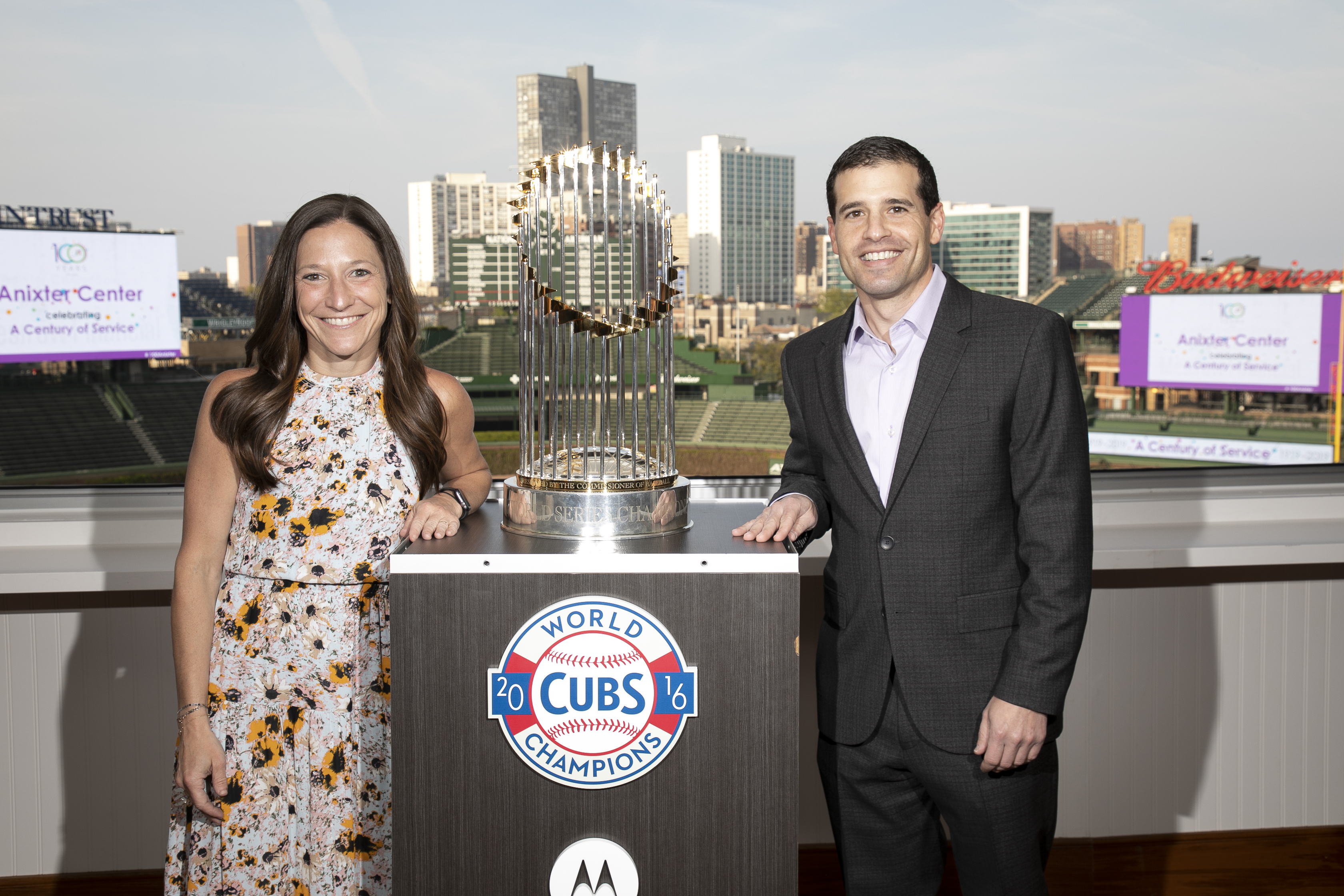 man and women with the world series trophy