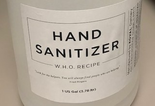 A close up view of the donated hand sanitizer from KOVAL Distillery.