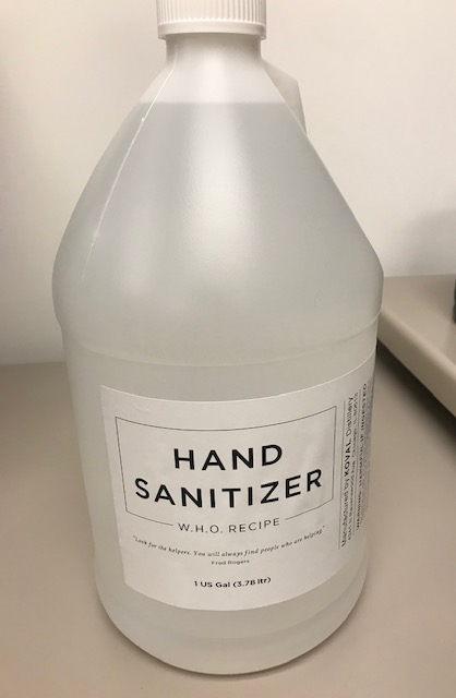 A gallon jug with hand sanitizer created by KOVAL Distillery.