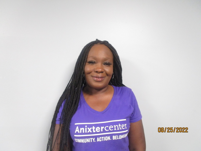 Donna smiling and wearing an Anixter t-shirt